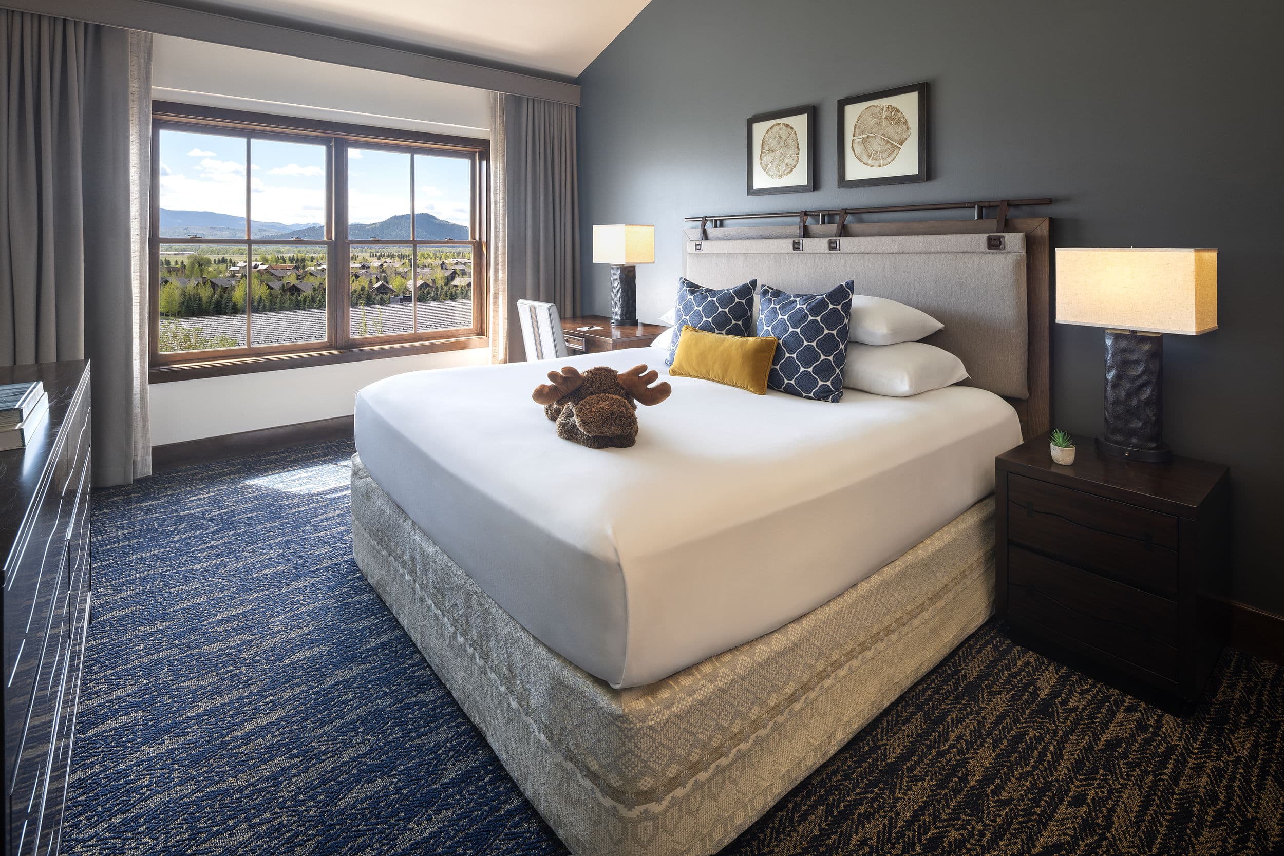 King bedroom with mountain views at Teton Mountain Lodge in Jackson Hole