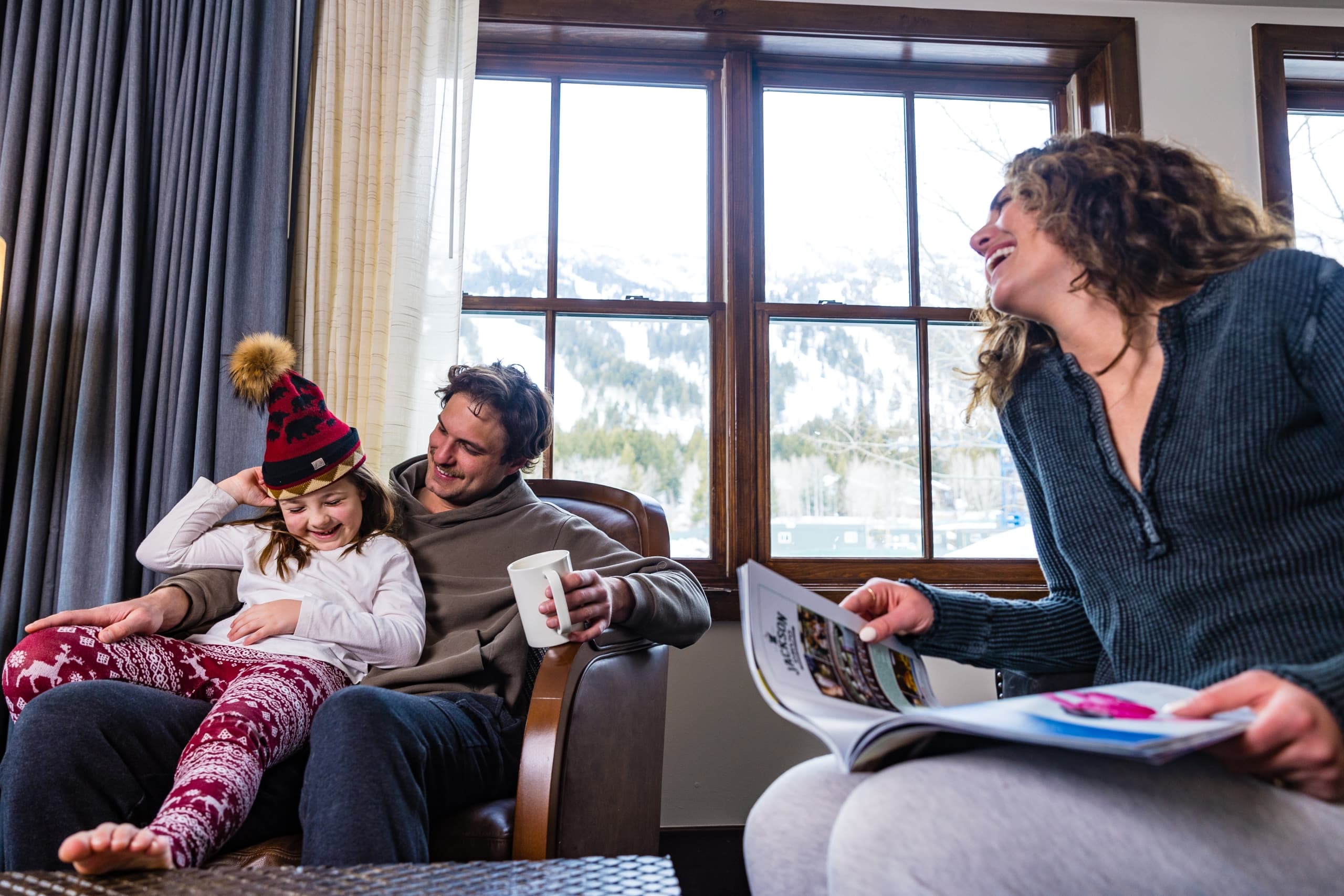A family enjoying in a guest room at Teton Mountain Lodge
