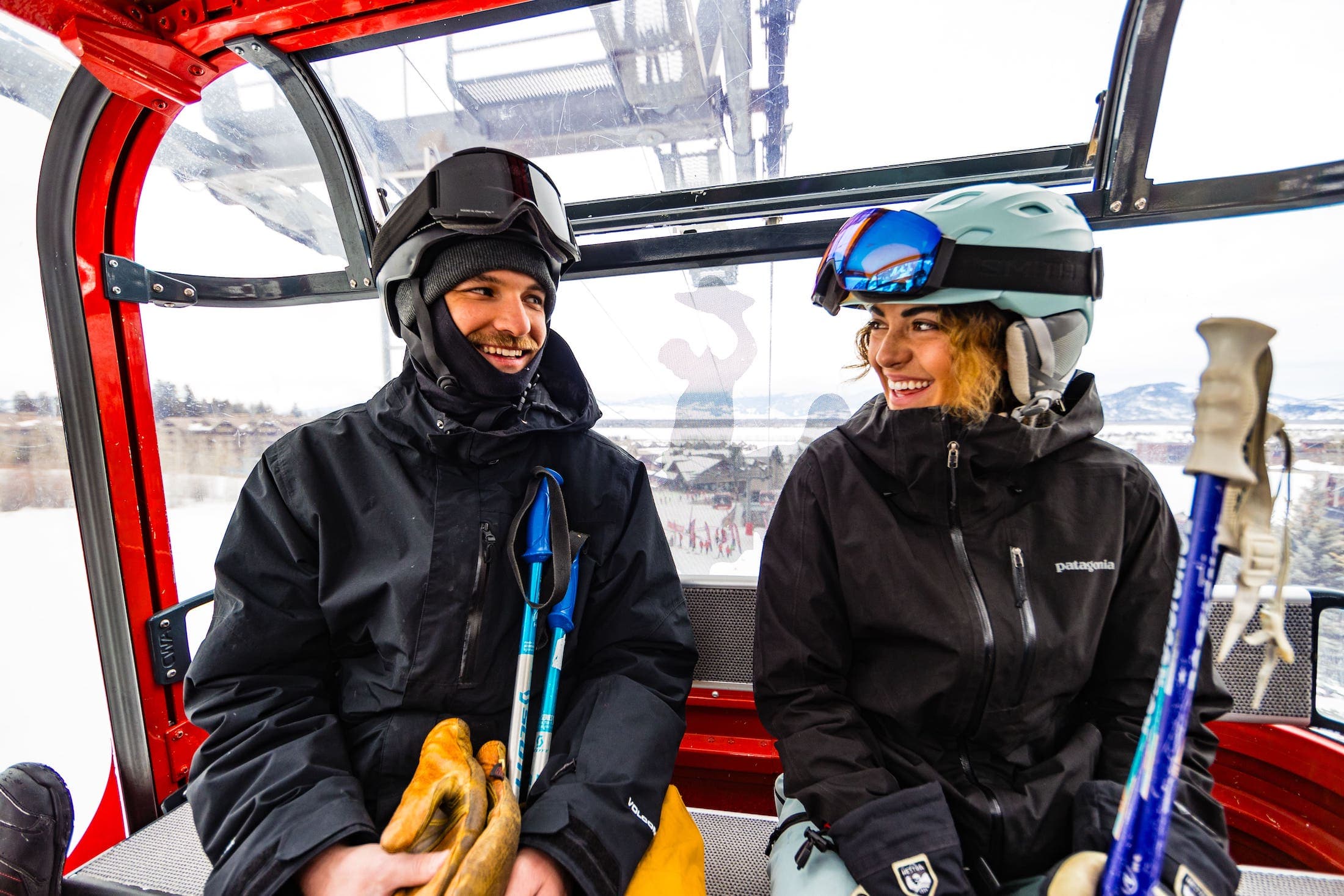 A man and a woman on the ski lift at Teton Mountain Lodge