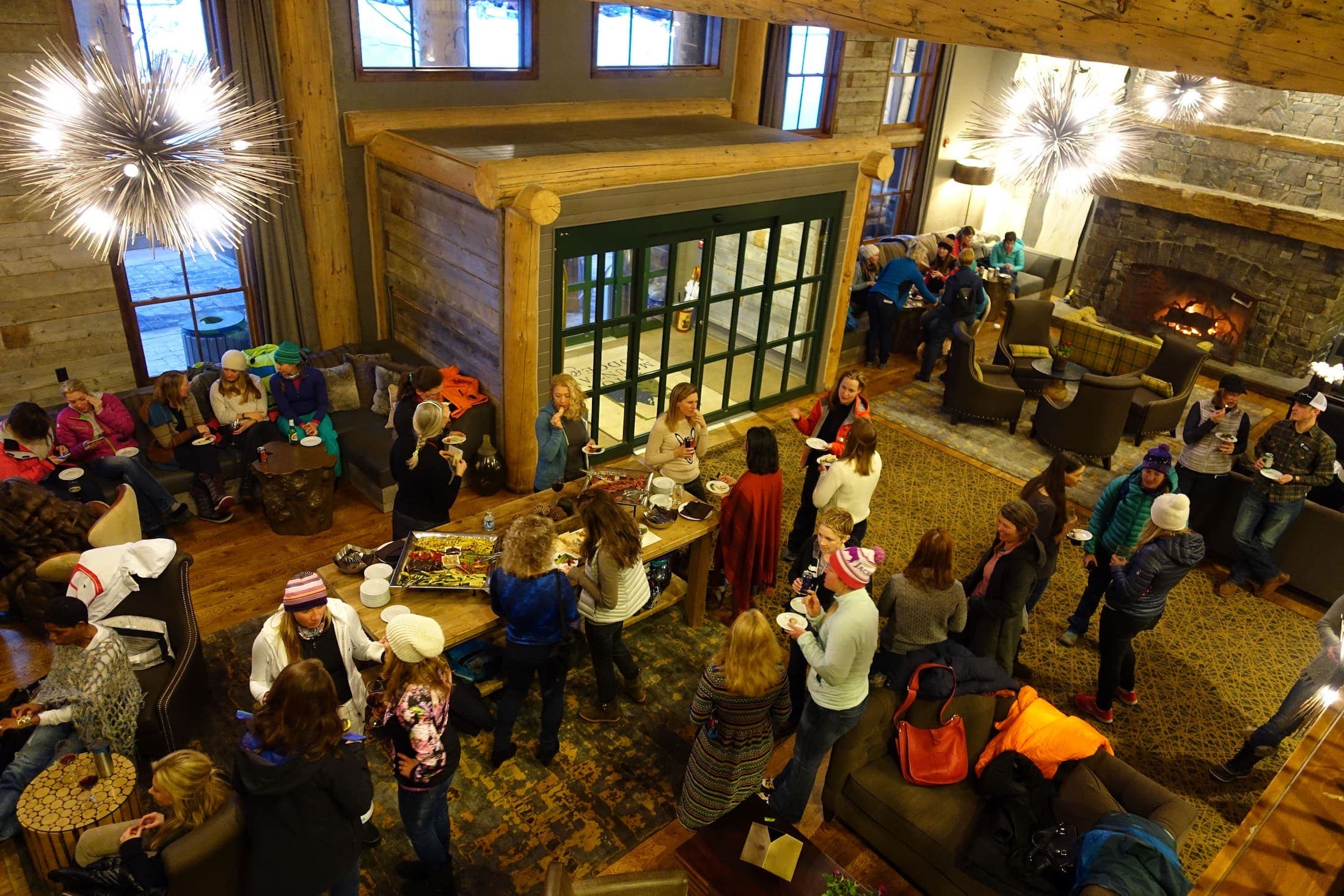 An reception event being held in the lobby of Teton Mountain Lodge