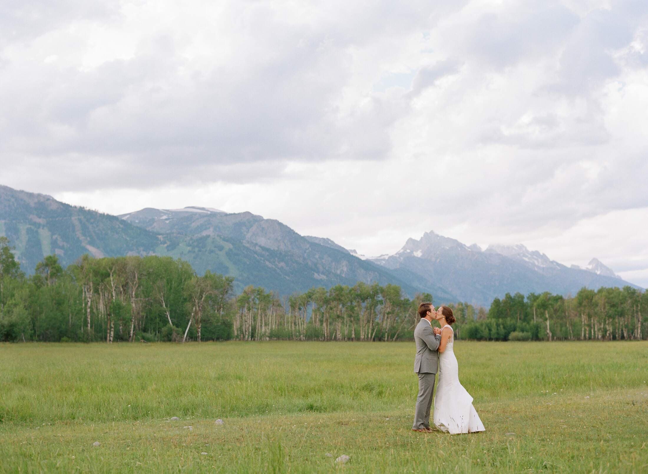 Bride and Groom with Tetons Background