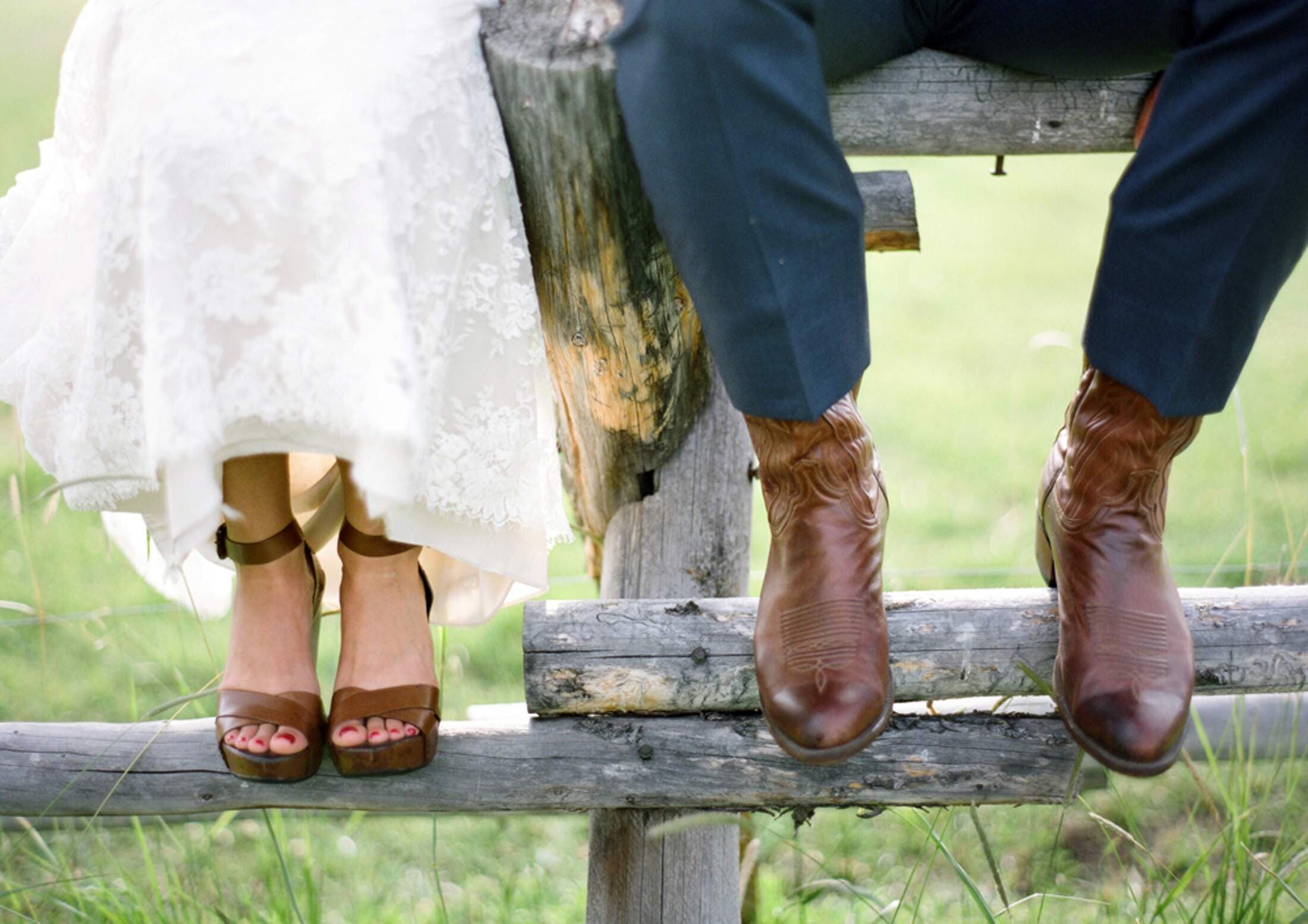 Jackson Hole Outdoor Wedding Bride Groom on Fence